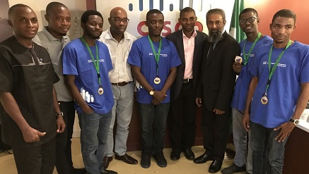 Alfie Hamid, Africa Regional CSR Manager and Imoh Akpan, CSR Manager in Nigeria both from Cisco are seen here photographed with the winning team, for the Cisco Hackathon, from Ahmadu Bello University Zaria.